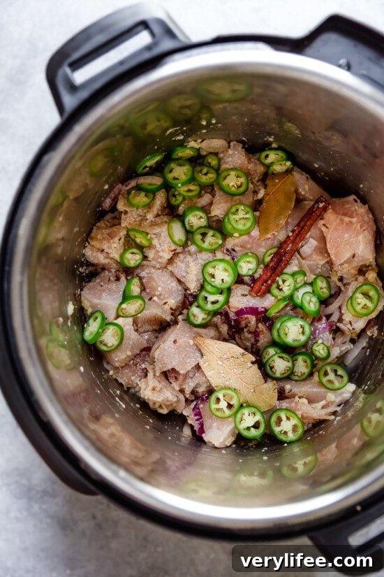 Chicken, chiles, and onions in an Instant Pot Chicken, chiles, and onions in an Instant Pot