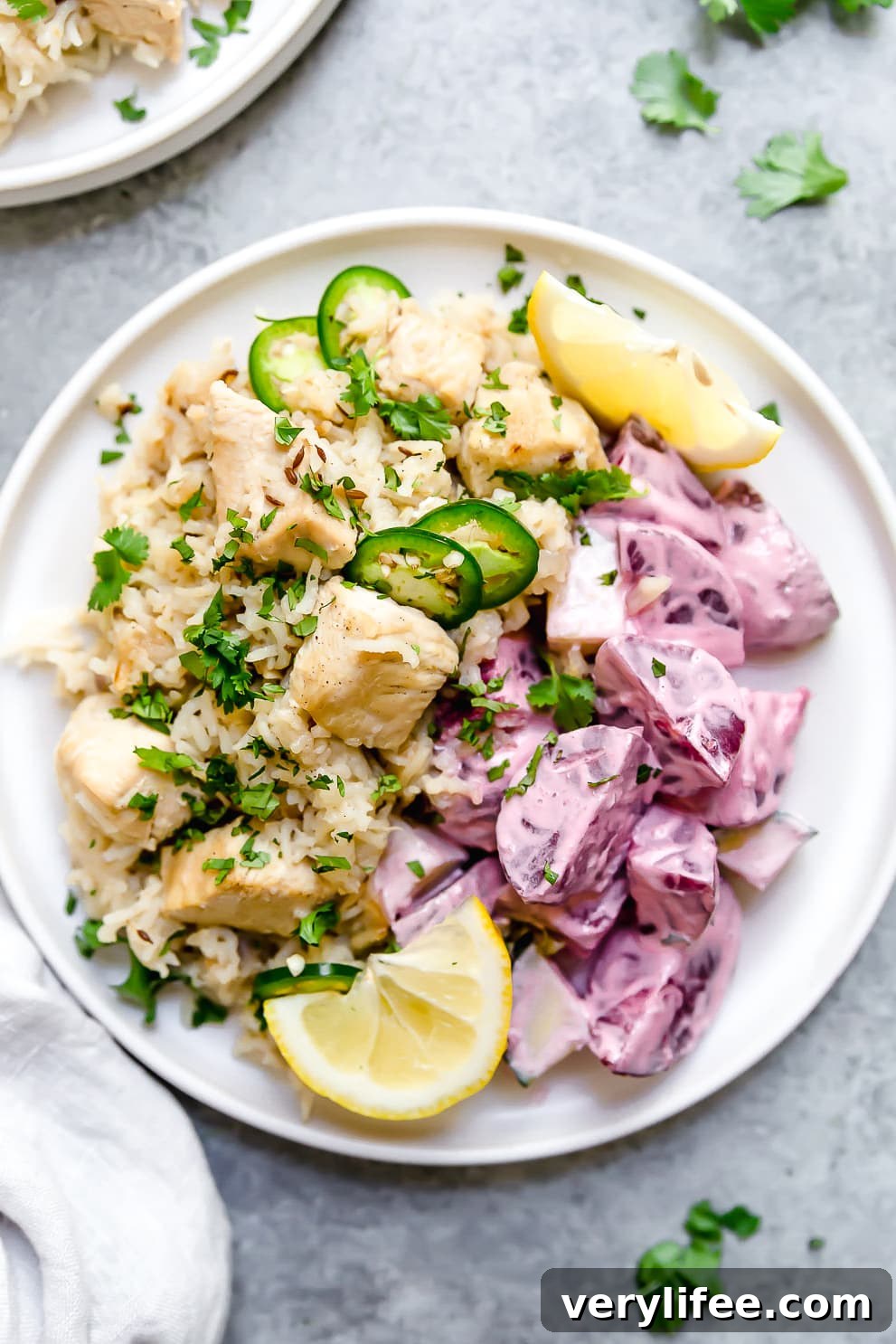 A plate of Indian pulao with lemon wedges A plate of Indian pulao with lemon wedges