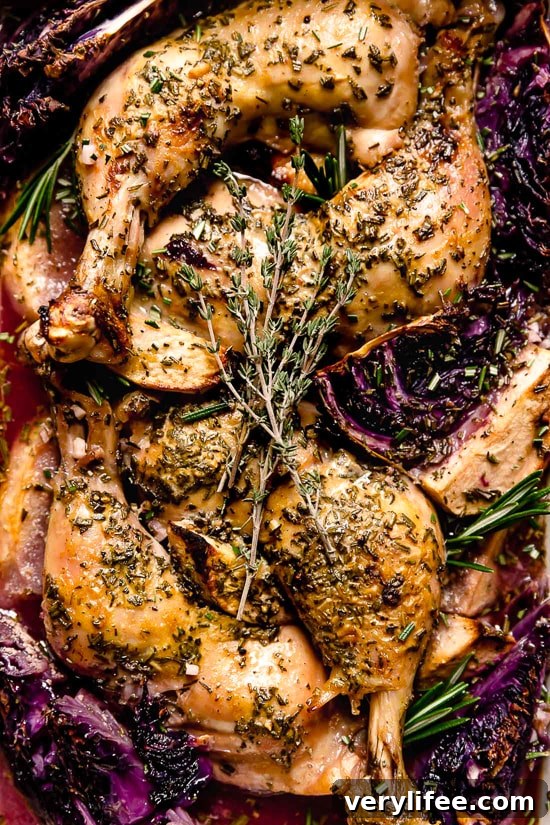 Baked Apple Cider Chicken and Cabbage is the perfect one-pot fall dish made with cider-marinated chicken, red cabbage and apples.