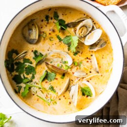 Asian Coconut Broth Clams made with lemongrass, ginger and cilantro is wonderful when paired with bread for dipping all that delicious broth!