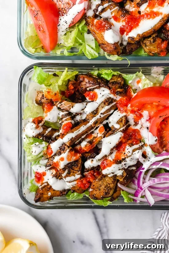25 Viral Skinnytaste Recipes That Defined 2019 10 Halal Food Cart inspired chicken served over a big salad of lettuce and tomatoes drizzled with a yummy white sauce.
