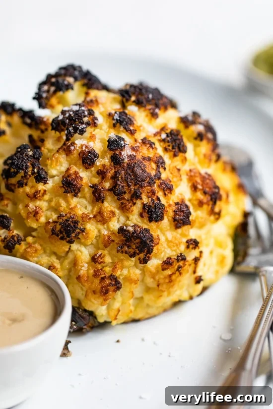 Whole Roasted Baby Cauliflower with Garlic and Herbs 2 Whole Roasted Baby Cauliflower - charred exterior, tender interior
