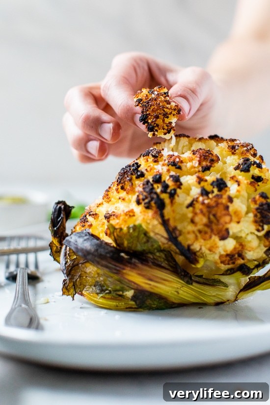 Whole Roasted Baby Cauliflower with Garlic and Herbs 3 Whole roasted baby cauliflower on a plate