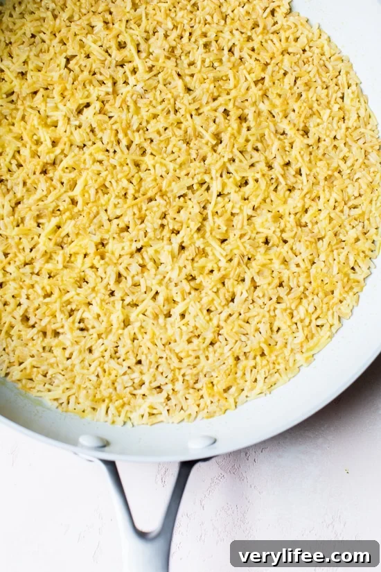 Rice pilaf in skillet.