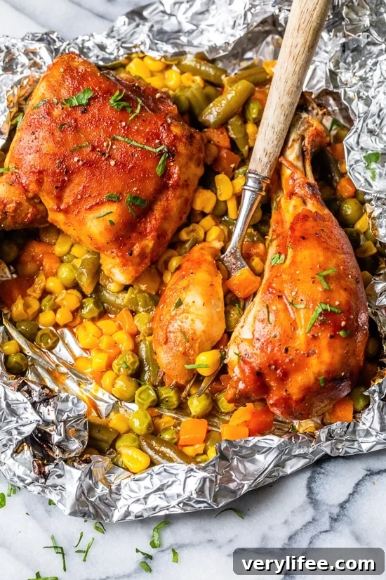 These easy 5-ingredient BBQ Chicken Foil Packets can be baked in the oven or made on the grill! An easy meal-in-one and the best part, easy cleanup!