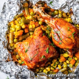 These easy 5-ingredient BBQ Chicken Foil Packets can be baked in the oven or made on the grill! An easy meal-in-one and the best part, easy cleanup!