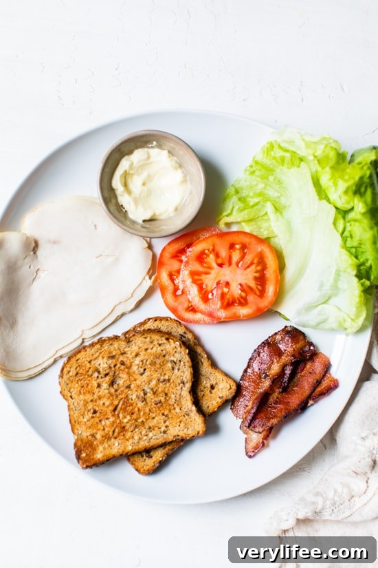 Classic Turkey Club Sandwich Recipe with Bacon and Avocado 5 turky sandwich with bacon