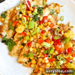Zesty Lime Grilled Chicken with Pineapple Salsa on a platter.
