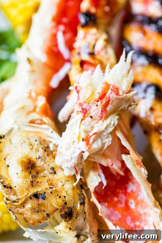 Smoky Grilled Crab Legs with Lemon Garlic Butter 5 Grilled Crab Legs out of the shell