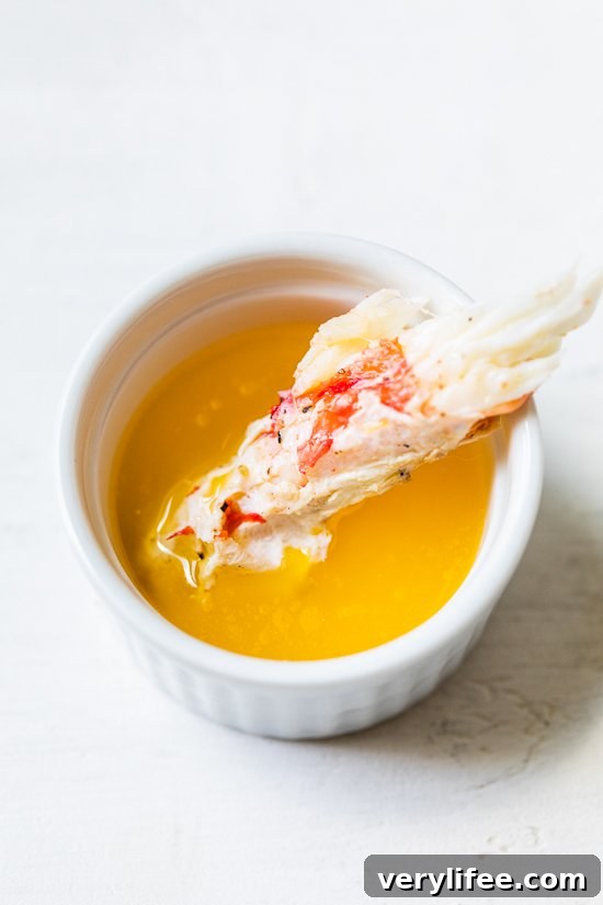 Smoky Grilled Crab Legs with Lemon Garlic Butter 7 Grilled Crab Legs in melted butter