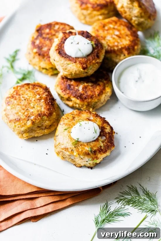 These low-carb Salmon Croquettes with Dill Sauce are healthier than traditional deep-fried ones and use only egg as a binder rather than breadcrumbs or crackers.