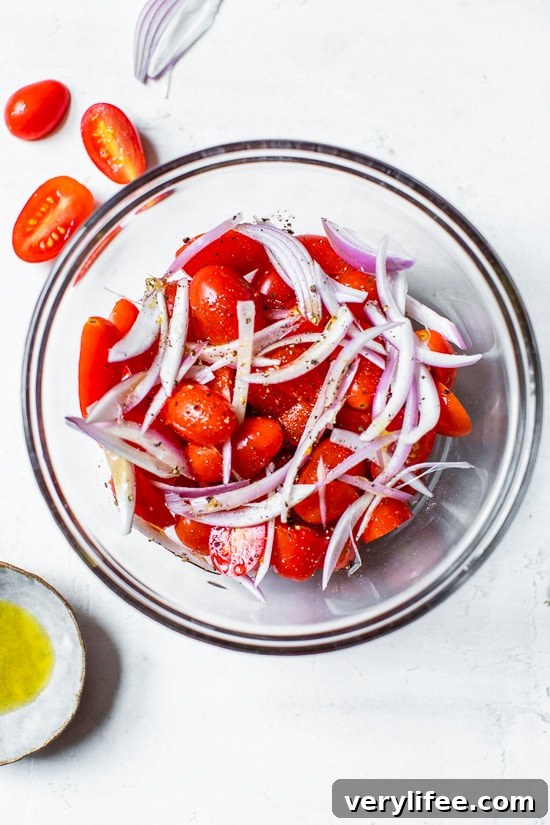 Creamy Whipped Ricotta Toast with Roasted Tomatoes 3 tomatoes in a bowl