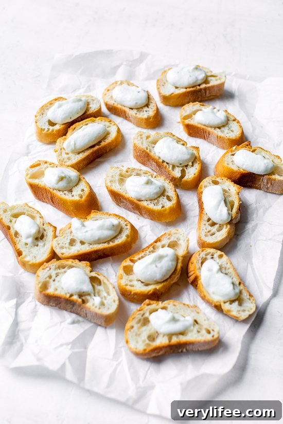 Creamy Whipped Ricotta Toast with Roasted Tomatoes 8 Top toast with whipped ricotta