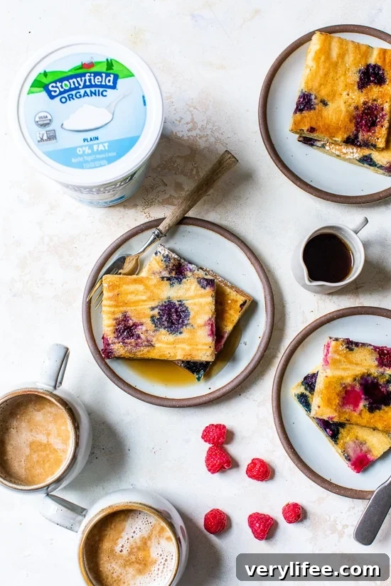 Sheet Pan Yogurt Pancakes with Mixed Berries 4 Yogurt Sheet Pan Pancakes with Mixed Berries on a plate