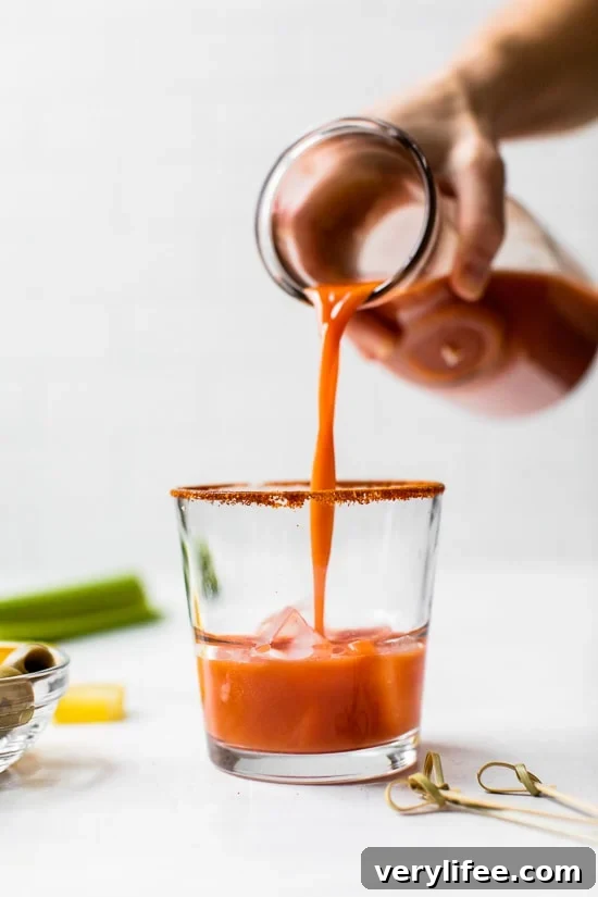 pouring tomato juice