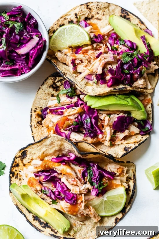 Slow cooker chicken tacos made with salsa and spices