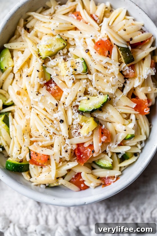 Orzo tossed with zucchini and tomato, a quick side or main