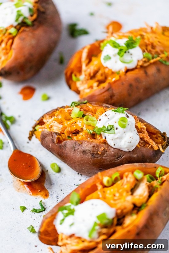 Chicken enchilada-stuffed sweet potatoes made in the slow cooker