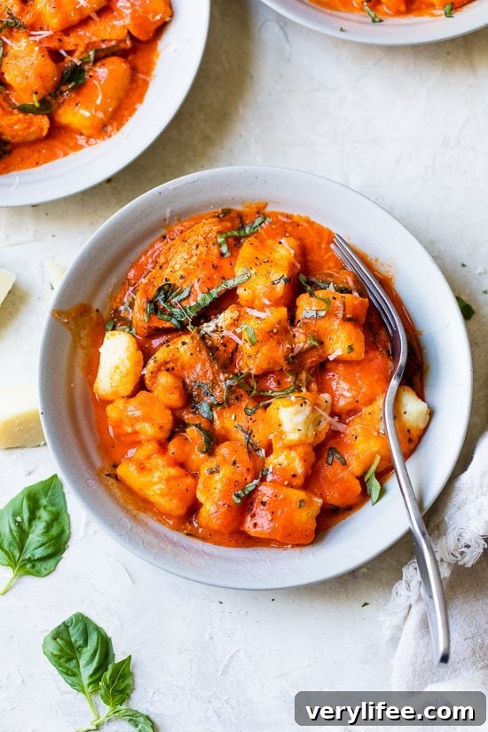 Gnocchi and grilled chicken in a roasted red pepper sauce
