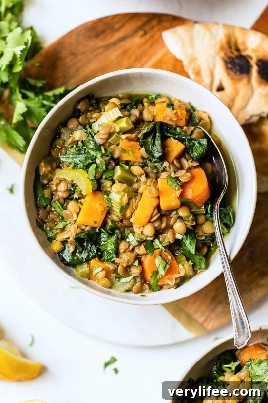 Hearty Lebanese lentil soup with kale, sweet potato and lemon