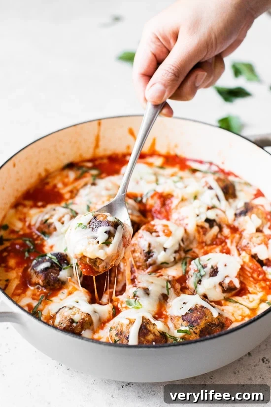 Cheesy turkey meatballs cooked in a single skillet