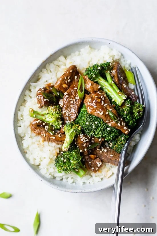 Beef and broccoli served over white rice