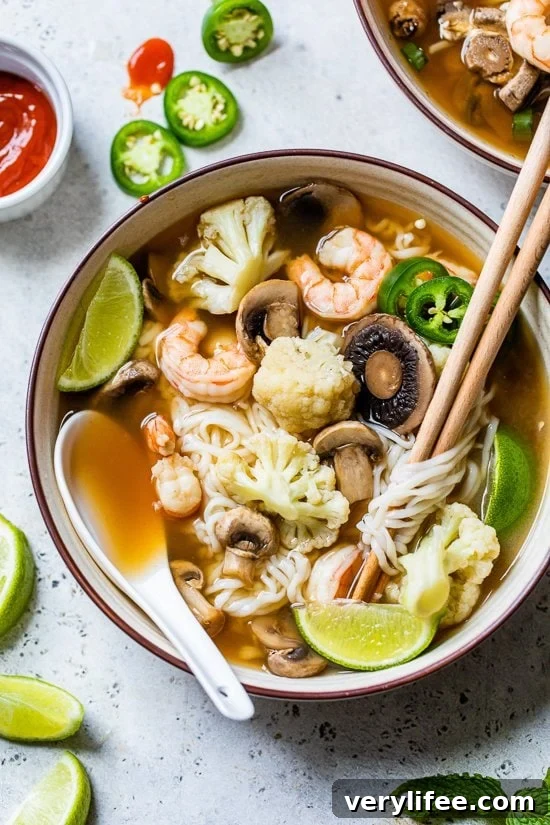 30-Minute Shrimp Pho with Fresh Vegetables 5 Shrimp noodle soup with chopsticks