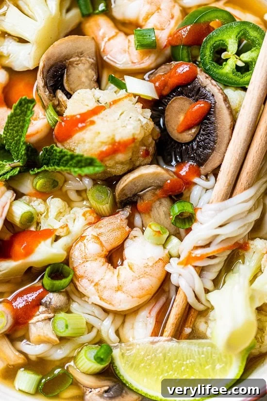 30-Minute Shrimp Pho with Fresh Vegetables 6 Shrimp veggies and noodle soup with chopsticks