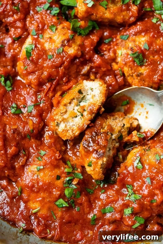 Spicy Harissa Chicken Meatballs Recipe 3 Chicken Meatballs in sauce.