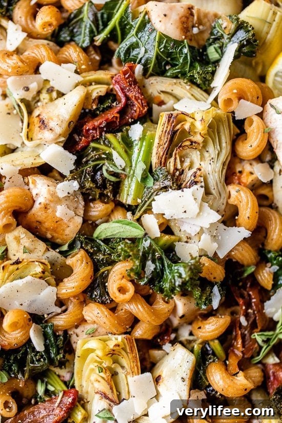 Creamy One-Pot Chicken and Artichoke Cavatappi Recipe 4 close up of One Pot Chicken and Artichoke pasta