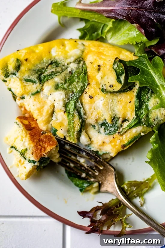This protein-packed Cottage Cheese Egg Bake with spinach and chicken sausage is filling and delicious. Enjoy for breakfast, lunch, or dinner with a salad and some crusty bread.