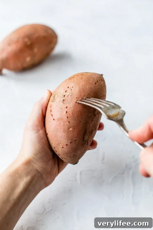 poke holes all over sweet potato with a fork