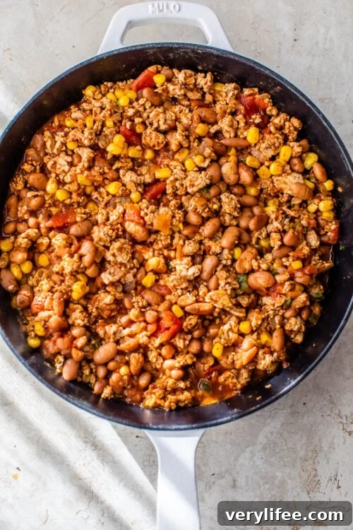 Skillet with ground turkey, beans and corn