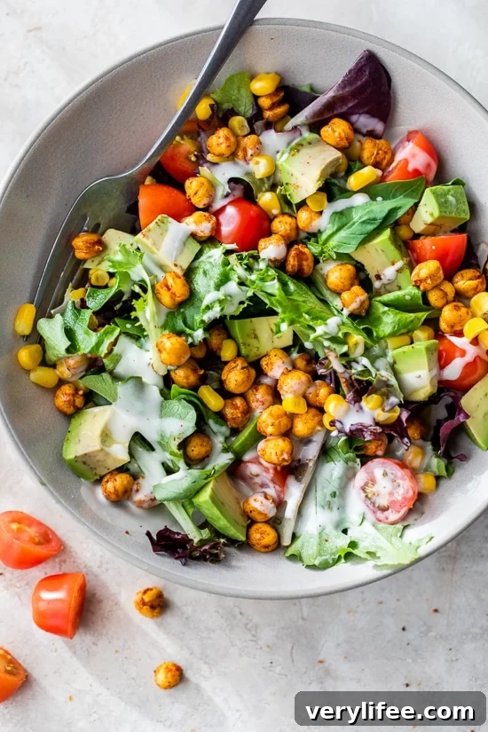 salad topped with air fryer chickpeas