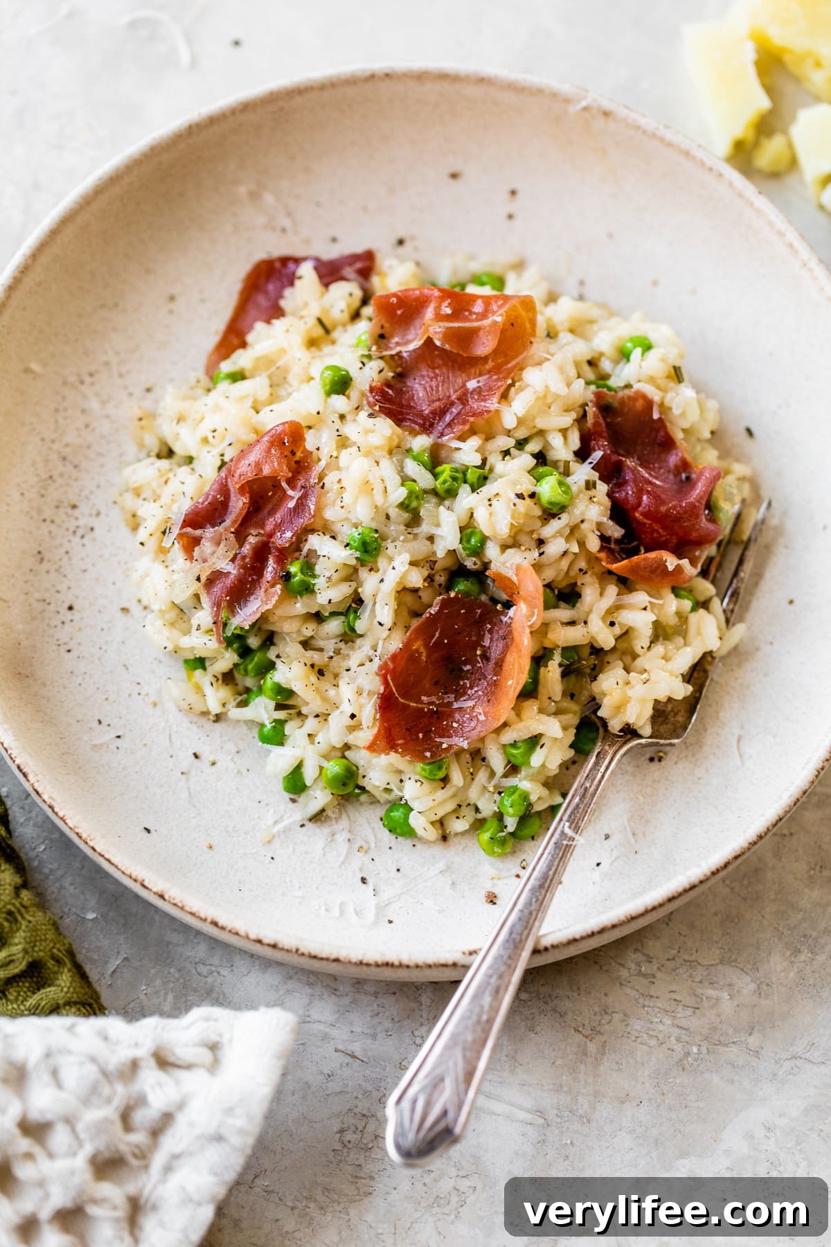 Overhead view of a bowl of Instant Pot risotto with prosciutto
