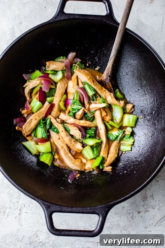 Garlic Ginger Chicken Stir-Fry Recipe 4 Chicken Stir Fry in a wok