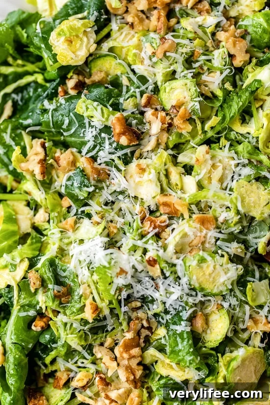 Kale and Brussels Sprout Salad with Parmesan and Pecans
