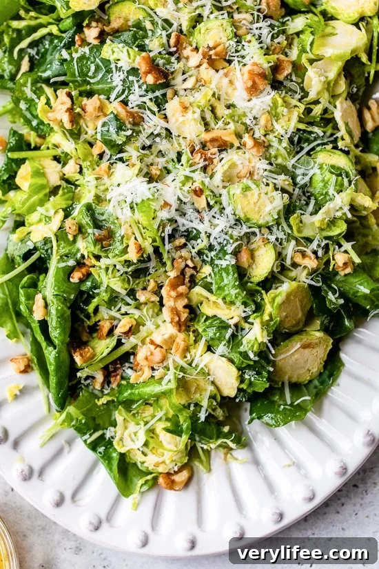 Kale and Brussels Sprout Salad with Parmesan and Pecans