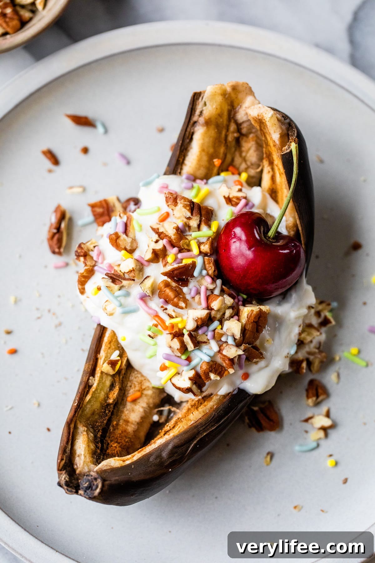 Air Fryer Banana Split Breakfast Recipe 2 Air Fryer Banana with yogurt, cherry and sprinkles