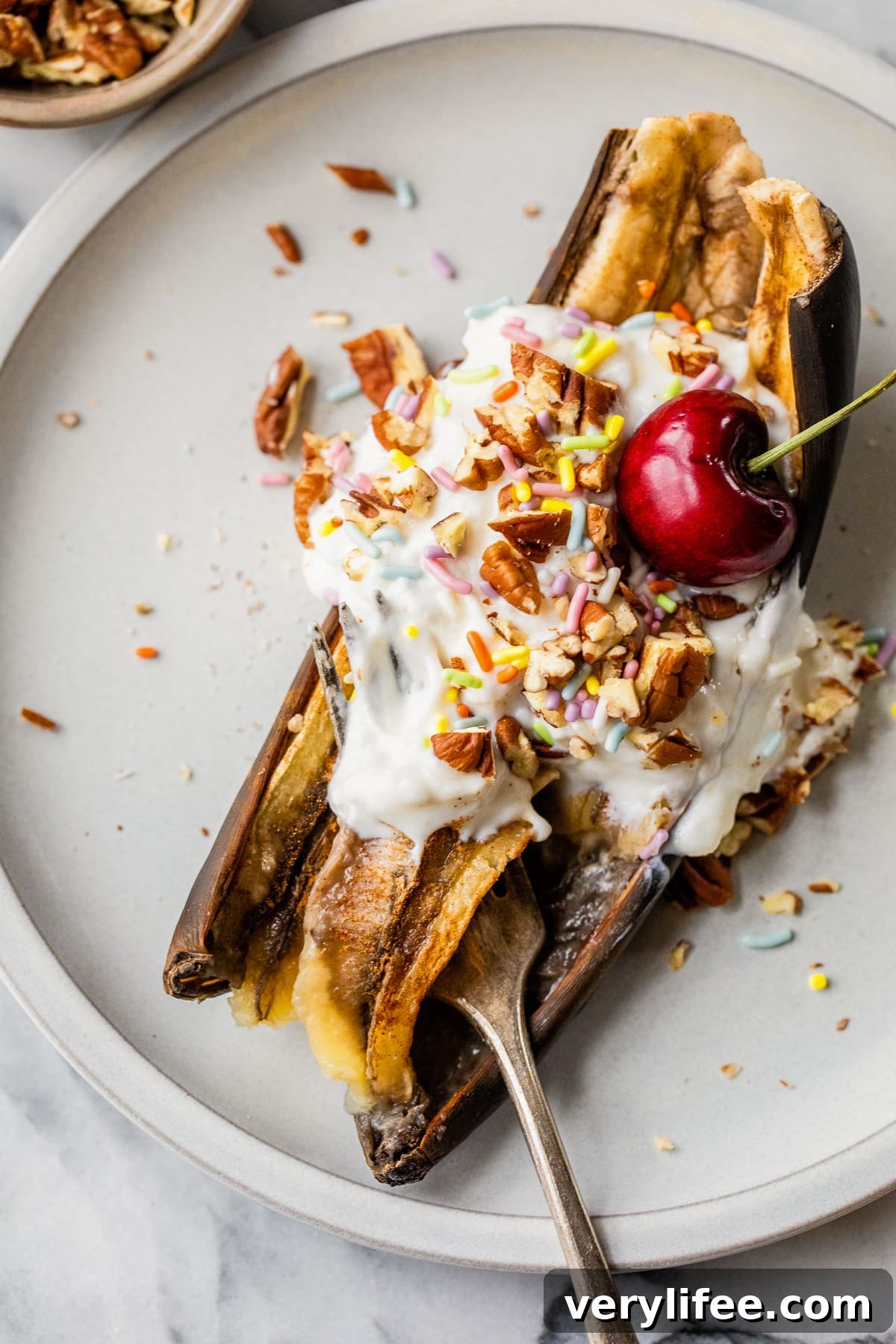Air Fryer Banana Split Breakfast Recipe 5 Air Fryer Banana with yogurt, cherry and sprinkles