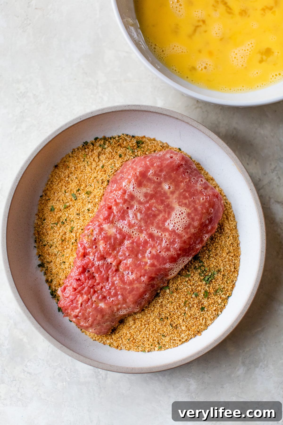 Crispy Air Fryer Breaded Cubed Steak Recipe 4 cubed steak in egg and breadcrumbs