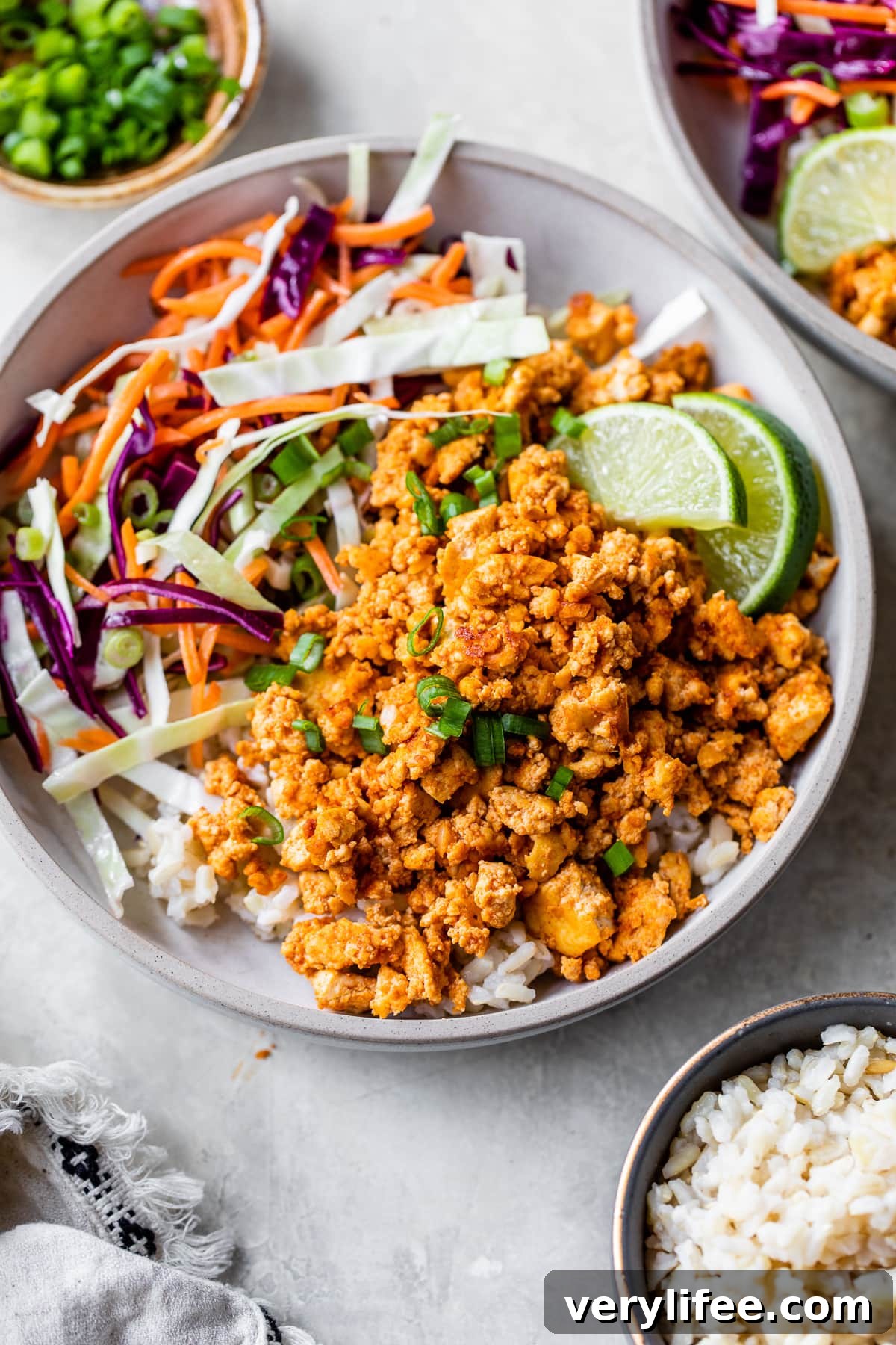 Tofu Rice Bowl with veggies and lime