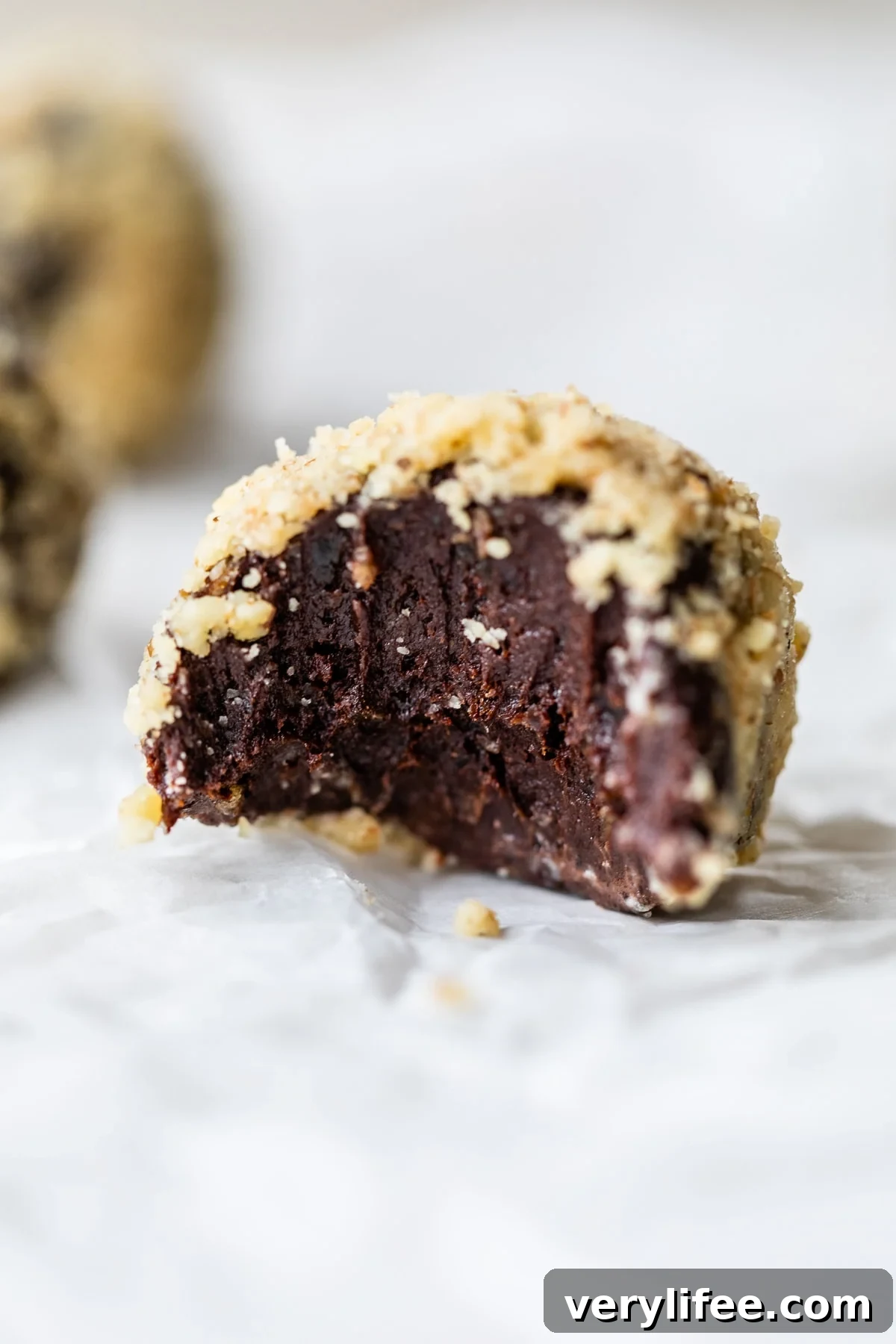 Close up of a chocolate ball to show the fudgy inside