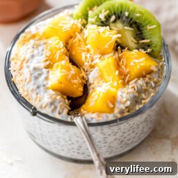 High-Protein Tropical Chia Pudding Breakfast Bowl 8 chia pudding with mango, coconut and kiwi