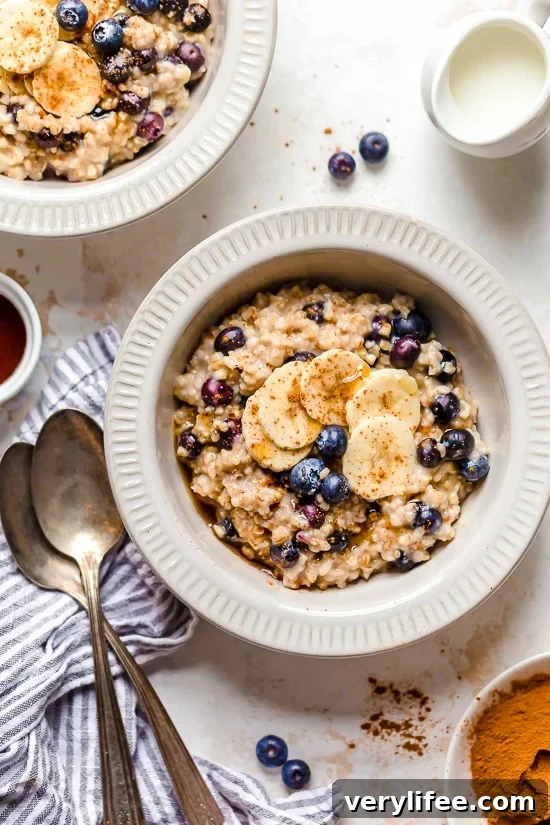 oatmeal recipes including this steal cut oats in a bowl with blueberries and banana.