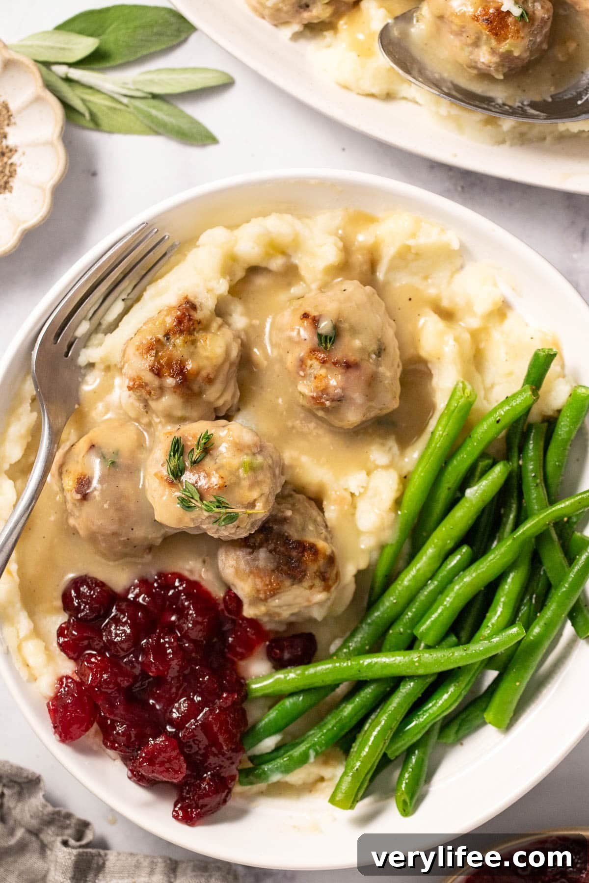 Thanksgiving Turkey Meatballs with Savory Gravy 15 Thanksgiving turkey meatballs made with stuffing mix and fresh herbs, served in homemade gravy over mashed potatoes.